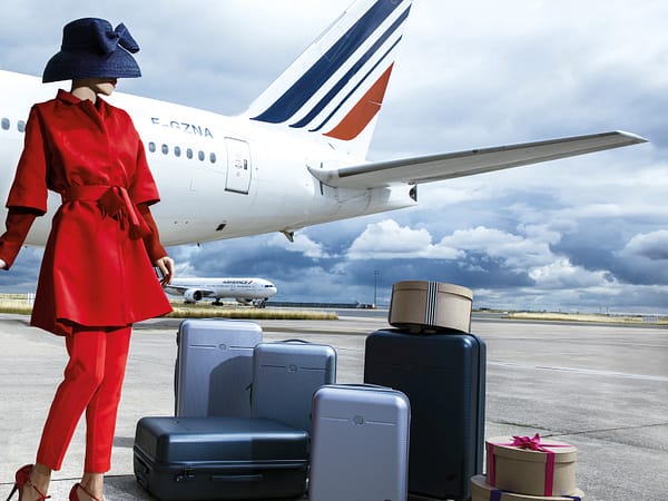 Suitcases in front of Air France Boeing 777